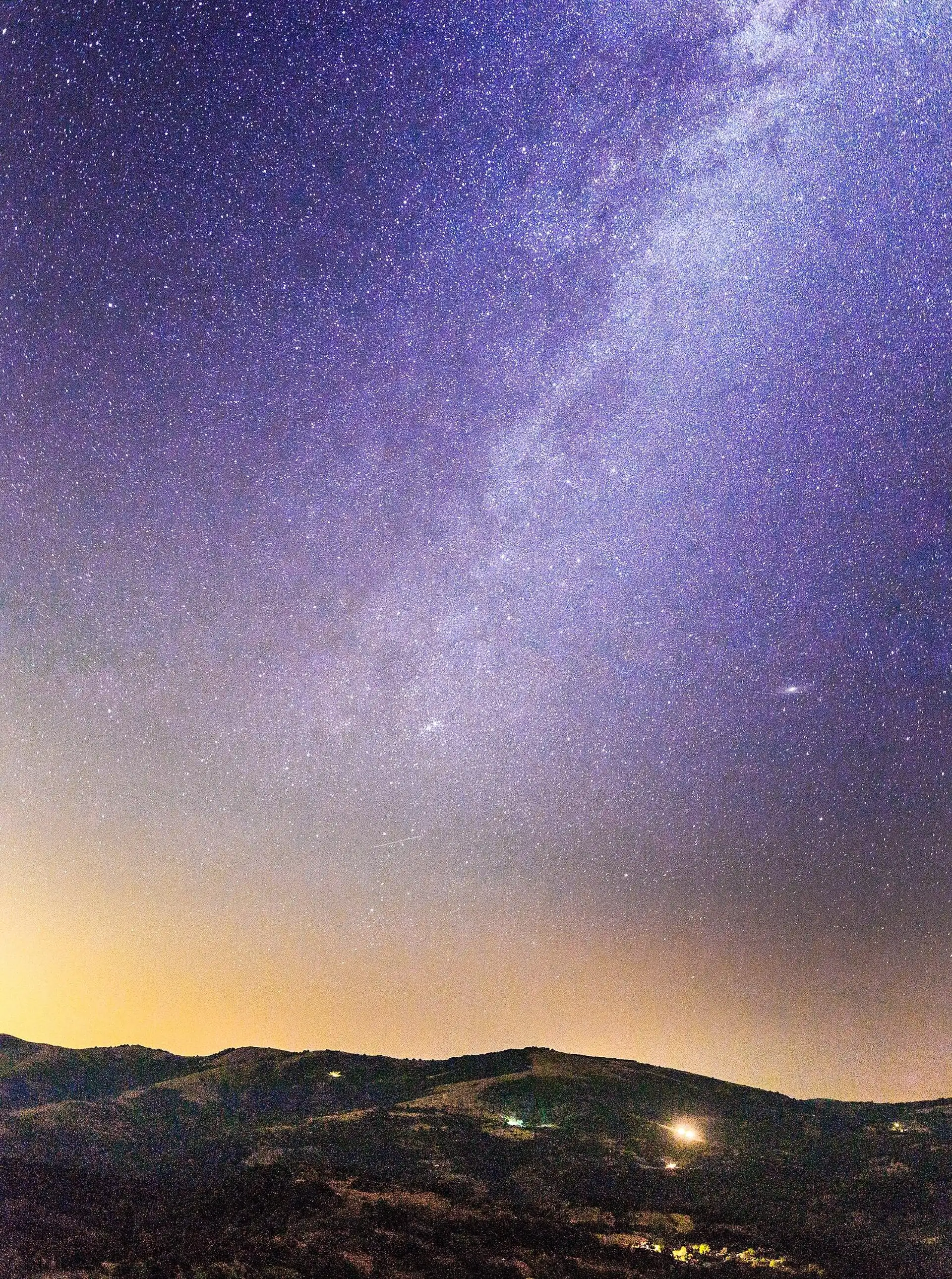 The Milky Way arching over the hills around Kokino